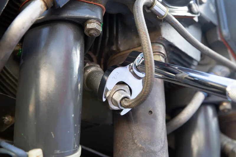 black and gray metal engine pipe